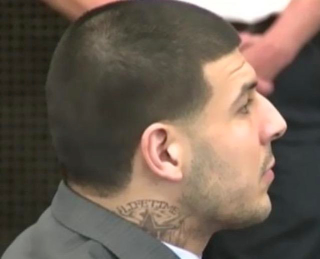 Illustration for article titled Aaron Hernandez Got A New Neck Tattoo In Prison